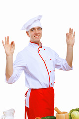 Young cook preparing food