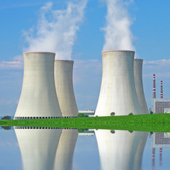 Nuclear power plant reflecting on the lake.
