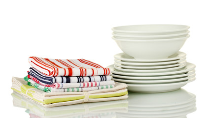 Kitchen towels with dishes isolated on white background