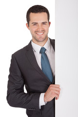 Successful businessmen presenting empty board