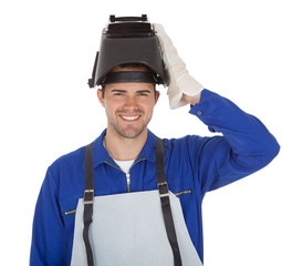 Portrait of confident young welder