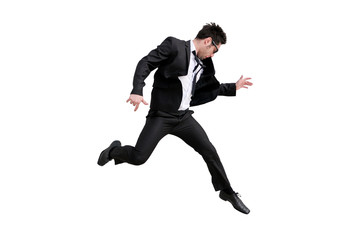 Fototapeta na wymiar Young handsome businessman with eyeglasses jumping, isolated on