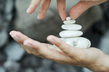  Gravel pile in hands