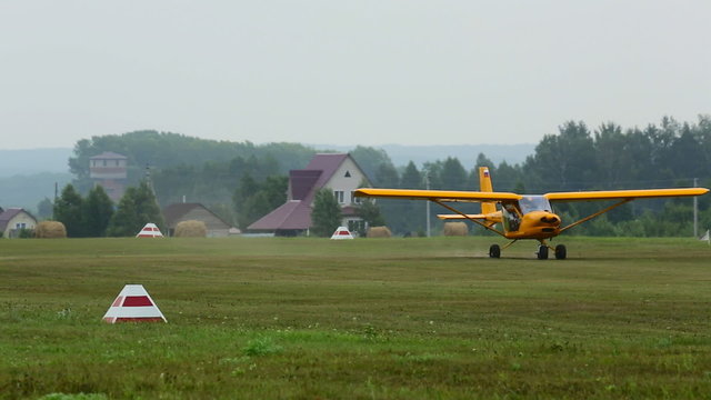 Small sport yellow plane.