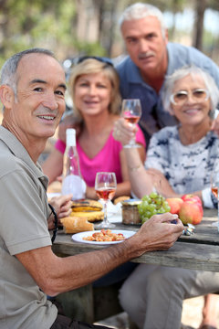 portrait of older people at picnic