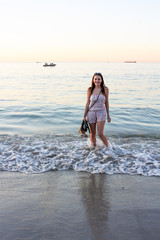 Woman havin fun in the water at the beach