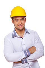 Portrait of sexy worker posing in studio in helmet