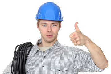 portrait of electrician thumb up