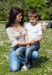 Fototapeta premium Boy with his mom at picnic