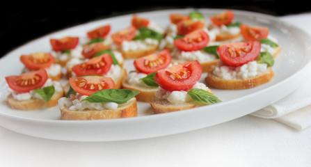 italian bruschetta with cherry tomato,basil and cheese