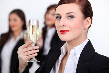 Businesswomen with champagne