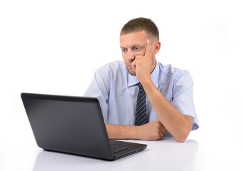 Thinking businessman and laptop on white background
