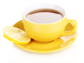 Yellow cup and saucer isolated on white
