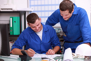 Laborers sharing a joke in the office