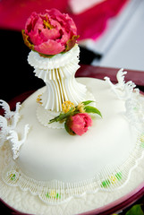 Beautiful white cake with rose