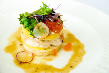 Chicken breast rolls with salad and fish eggs