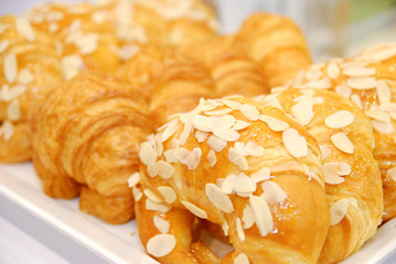 Fresh croissants and almond croissants