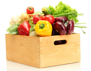 Fresh vegetables in wooden box isolated on white