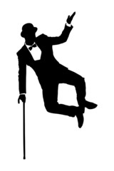 Silhouette of a man in suit holding a cane and dancing