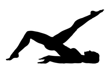Silhouette of a female exercising