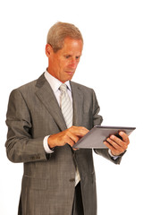 Senior business man with tablet