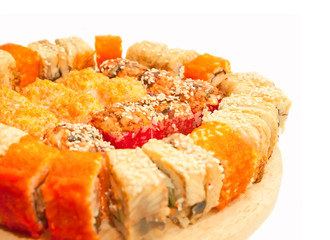 sushi rolls in range on the desk isolated on white