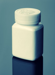 White pills bottle