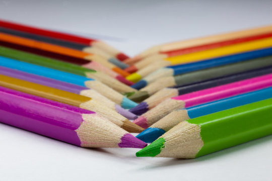Crossed colorful pencils