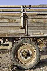 Car with wooden trailer