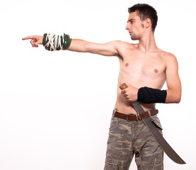 Young fighter holding a machete