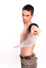 Young fighter holding a machete