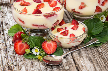 Bowls with Vanilla Pudding and Fruits