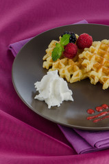 Tasty waffle with fruits