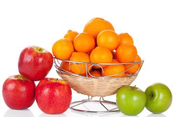 bucket of apples and oranges isolated on white