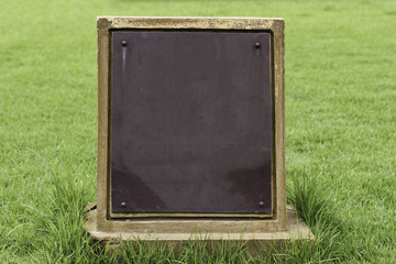 Note in green grass.