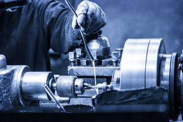 Turning lathe in the workshop in blue