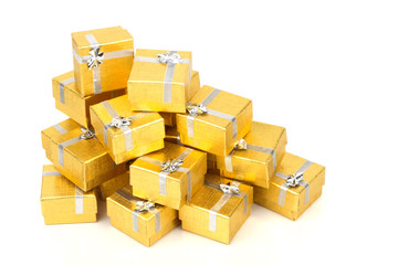 Top view of towel of gold gift boxes