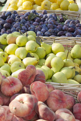 Tasty organic freshly picked fruit on market stand