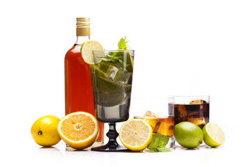 Exotic alcohol drinks set with fruits