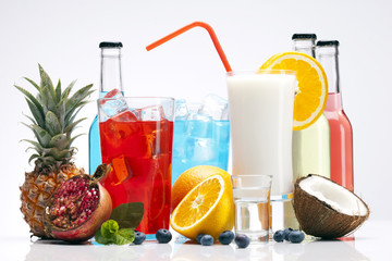 Exotic alcohol drinks set with fruits