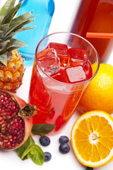 Exotic alcohol drinks set with fruits