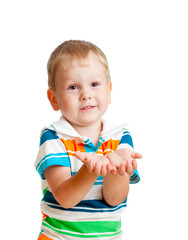 Little child boy reaching his hands out, isolated on white