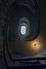 Grunge spiral stairs hall