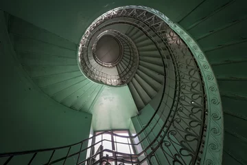 Küchenrückwand glas motiv Spiral old green and grunge staircase © Cinematographer