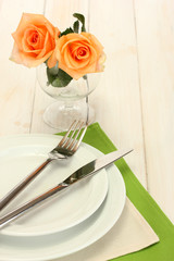 beautiful holiday table setting with flowers