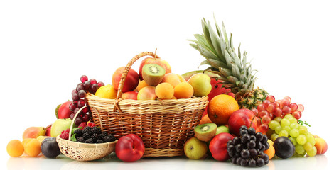 Assortment of exotic fruits and berries in baskets isolated