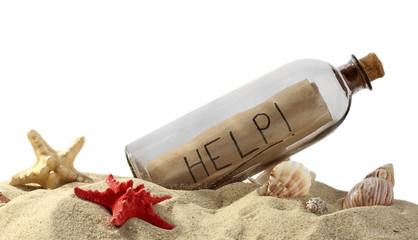 Glass bottle with note inside on sand isolated on white