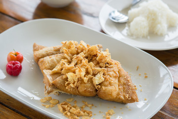 Fried fish with Garlic. usually eat with chili sauce and rice