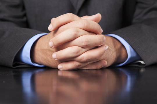 Businessman Hands Clasped