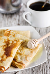 Pancakes with honey and coffee